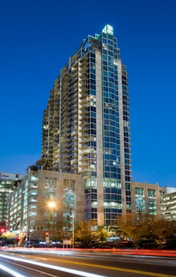 Rendering of a multifamily high rise in the evening